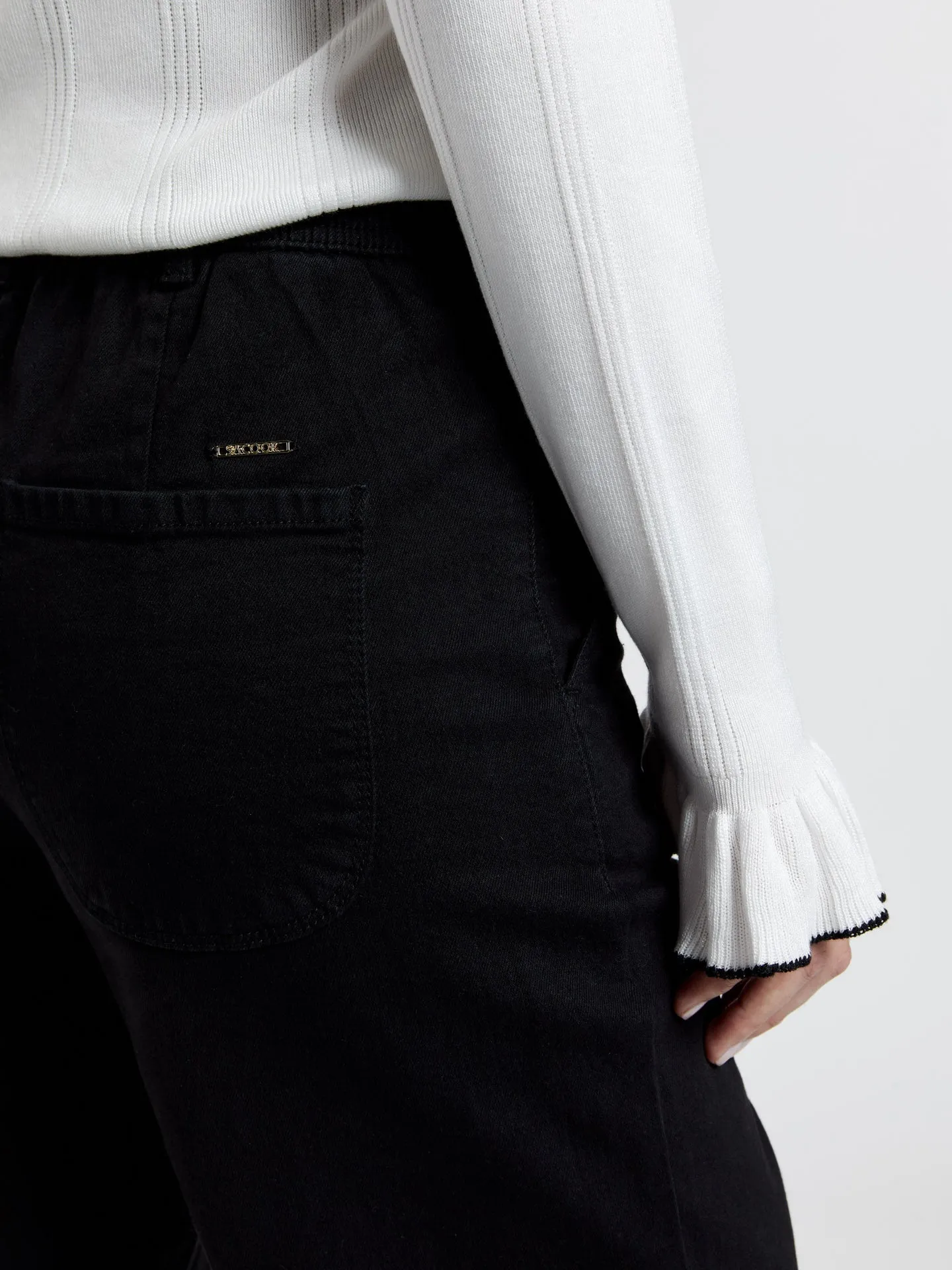 Chino trousers with back patch pockets